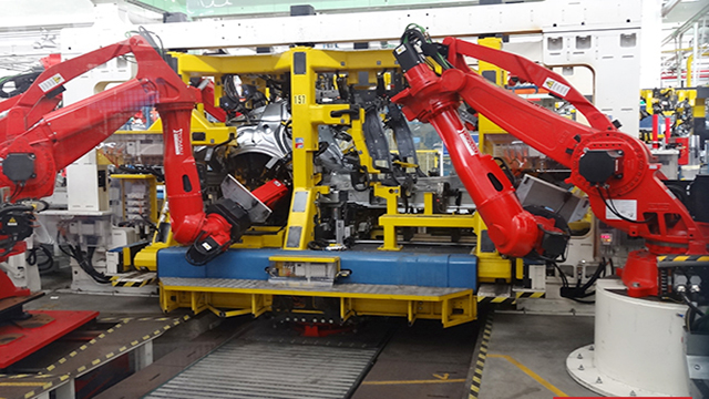 Компания Comau демонстрирует, как ее роботы собирают Maserati - 1